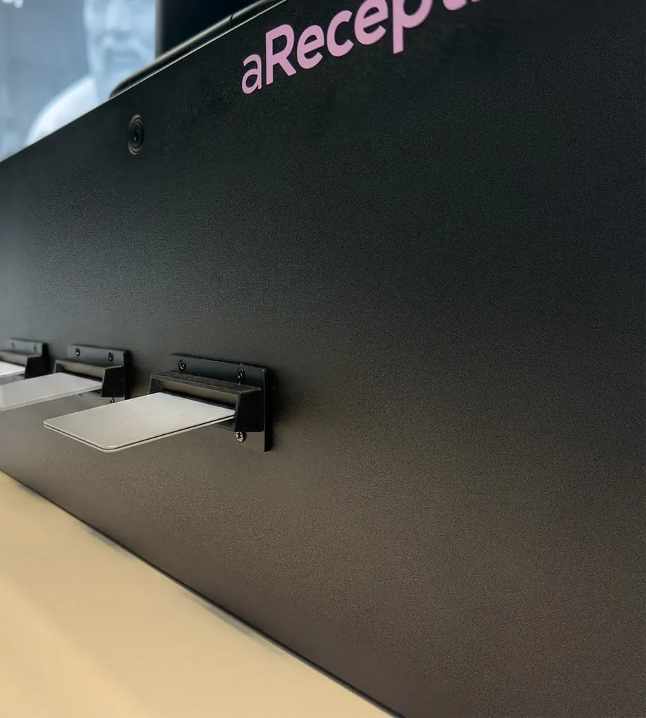 Card dispenser on the aReception kiosk with three cards issued