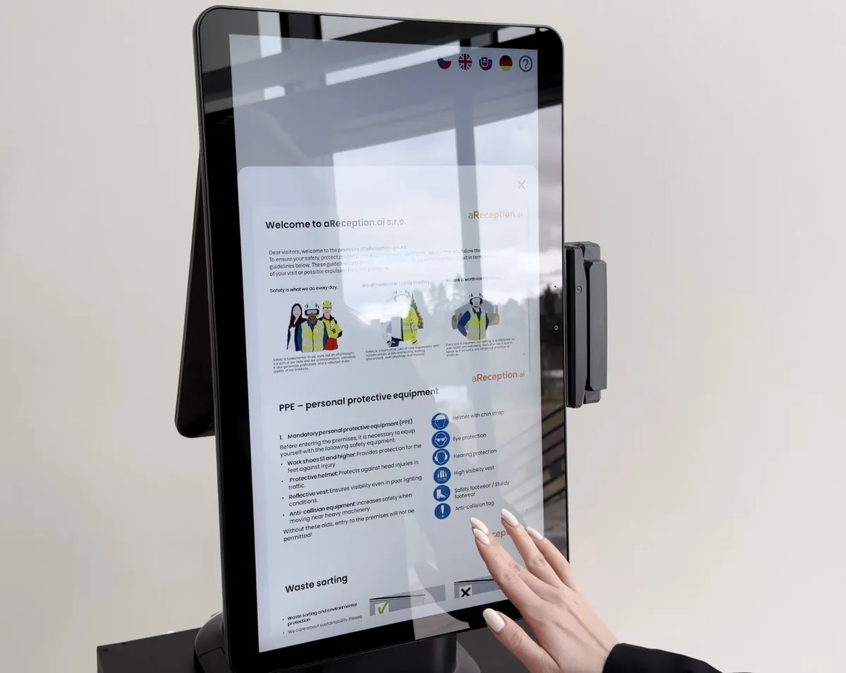 A safety induction on the screen of the aReception kiosk
