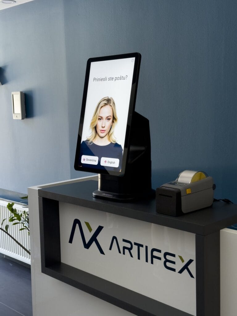 aReception AI receptionist kiosk on the Artifex Lozorno reception desk