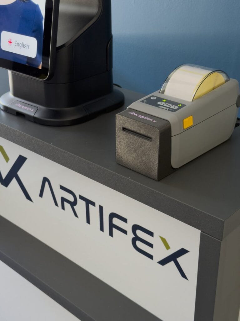 Zebra ZD411 badge printer next to the aReception kiosk at Artifex Lozorno